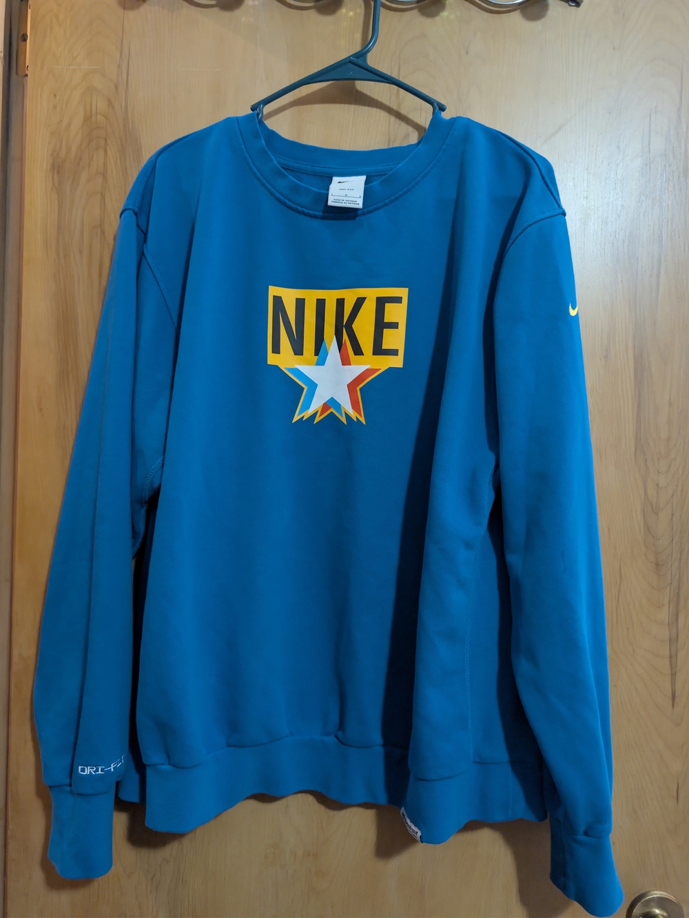 Nike Blue Crewneck Sweatshirt with Multicolor Star Logo